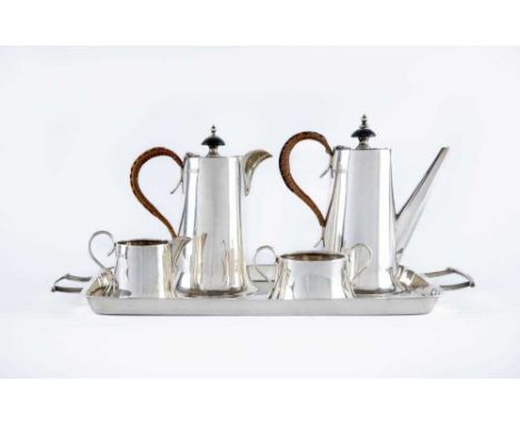 AN ART DECO SILVER FIVE PIECE CAFÉ-AU-LAIT SET, by Walker &amp; Hall, Sheffield 1931, of swept cylindrical form, comprising c