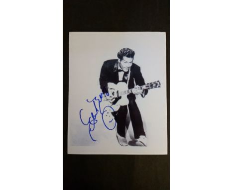 ENTERTAINMENT, signed reproduction b/w photo (8 x 10) signed by Chuck Berry, showing him playing guitar, VG