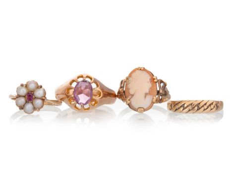 FOUR GOLD DRESS RINGS, including one set with amethyst and another with ruby and seed pearls, three in nine carat gld and one