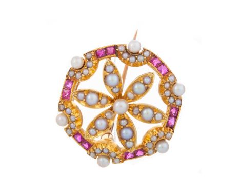EDWARDIAN RUBY AND SEED PEARL BROOCH,  in the form of a flower, set with seed pearls and rubies, unmarkedGenerally worn. Rubi