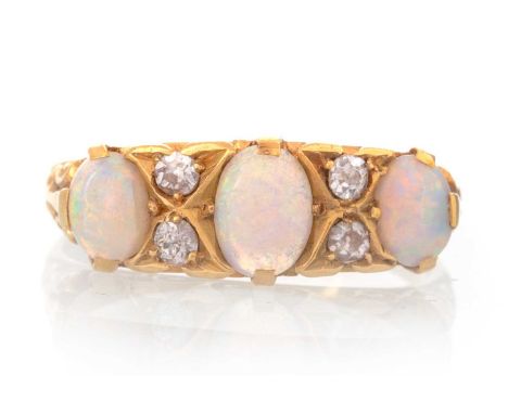 VICTORIAN OPAL AND DIAMOND RING,  set with cabochon opals interspaced by old cut diamonds, unmarked, size LQty: 4.2gUnmarked 
