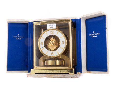 JAEGER LeCOULTRE 'ATMOS' CLOCK CIRCA 1963 no. 138272, the white enamel circular dial set with gilt dagger hour markers and Ar