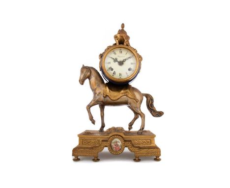 ITALIAN GILT METAL EQUESTRIAN MANTEL CLOCK IMPERIAL, CONTEMPORARY the signed dial set with Roman numerals, the drum head urn 