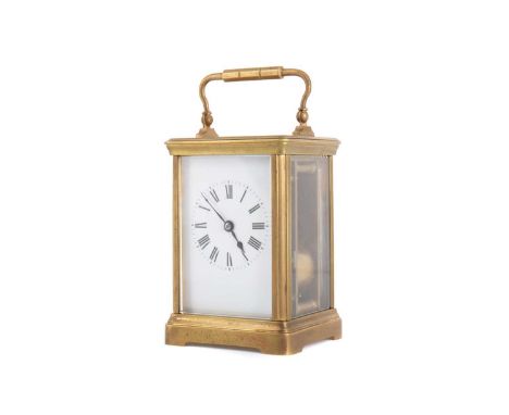CARRIAGE CLOCK LATE 19TH/EARLY 20TH CENTURY with two train eight day movement, the white enamel dial with Roman numerals, in 