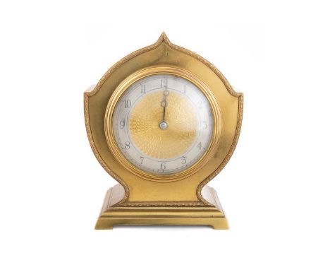 FRENCH ART DECO GILT METAL MANTEL CLOCK EARLY 20TH CENTURY with single train movement, the silvered chapter ring set with Ara