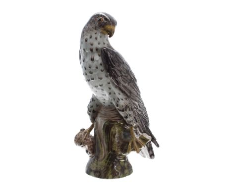 20th century German&nbsp;Berlin KPM porcelain figure of a hawk, modelled upon a trunk, marked Habicht to the lower side, blue