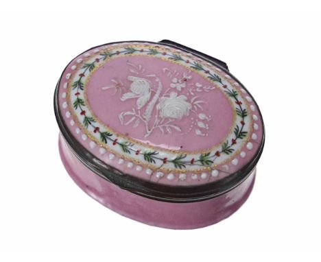 Late 18th/early 19th century Staffordshire enamel oval patch box, the hinged cover with a Jasper Ware type white floral posy 