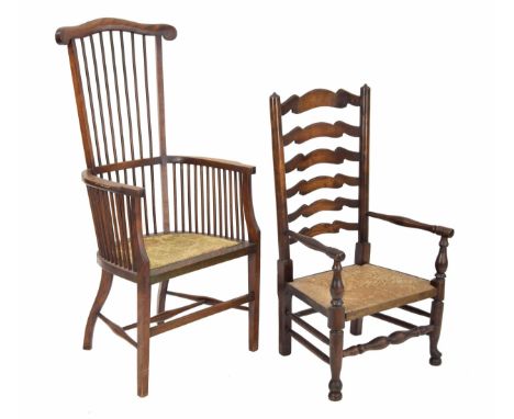 A wavy ladder back oak fireside chair with rush seat, 22" wide, 19" deep, the seat 13" high, the back 40" high; together an E