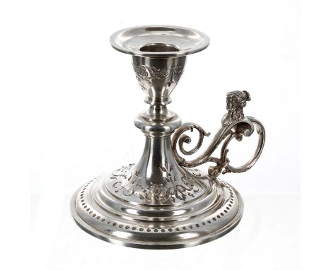 Ornate French silver chamber stick, with a knopped stem and scrolling handle cast with the bust of a lady, over a a base with