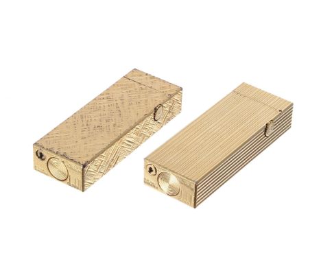 Dunhill 'Rollagas' gold plated cigarette lighter, with a fluted body, made in Switzerland, 2.5"; together with another Dunhil