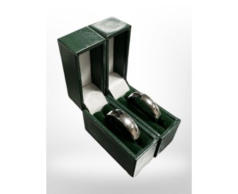 Two titanium wedding bands.