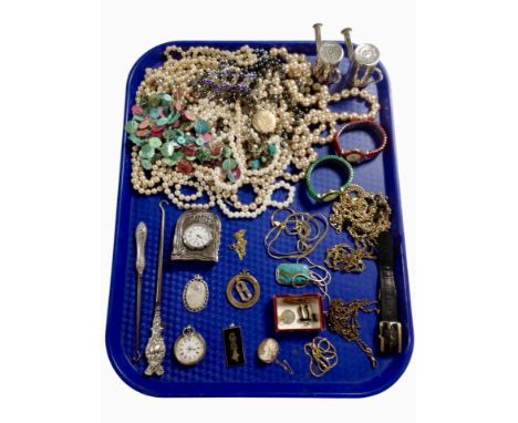 A collection of jewellery including a 9ct gold brooch, a continental engraved silver ladies' fob watch with enameled dial, va