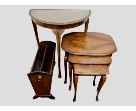 A reproduction beech demi-lune hall table, a reproduction carved beech nest of three tables, width 53 cm, and a magazine rack