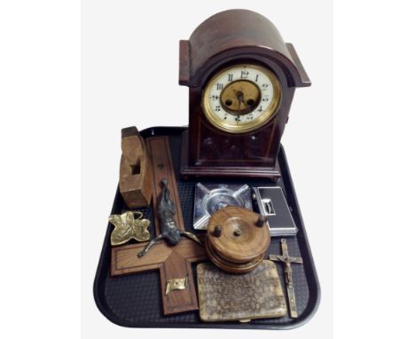 An Edwardian mahogany and satinwood-inlaid mantel clock, together with two crucifixes, a wooden fishing reel, antique wallet,