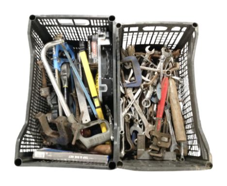 Two crates containing assorted hand tools, vices, etc.
