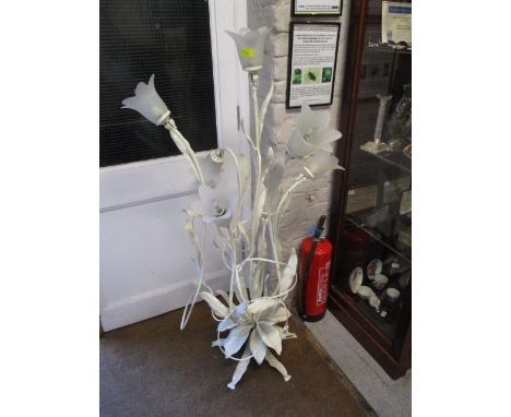A floor standing white painted flower shaped lamp 55" high 