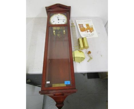 A Kieninger Germany, mahogany cased wall hanging clock, white enamel Roman dial with three winding holes, subsidiary seconds 