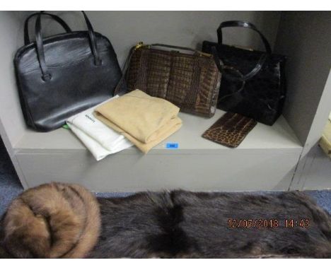 Vintage handbags to include a crocodile bag, together with a vintage stole and hat 