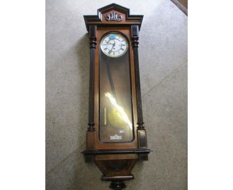 A mahogany cased Victorian wall clock 