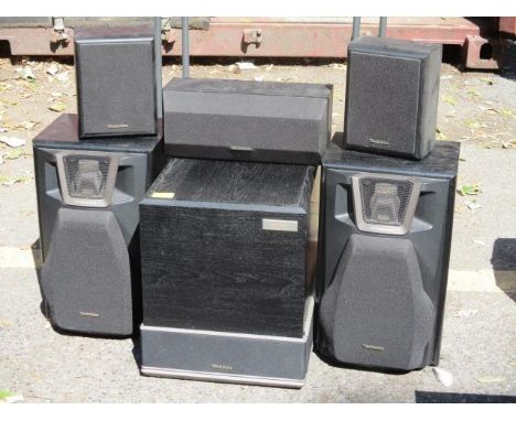 A Technics sound system with speaker stands 