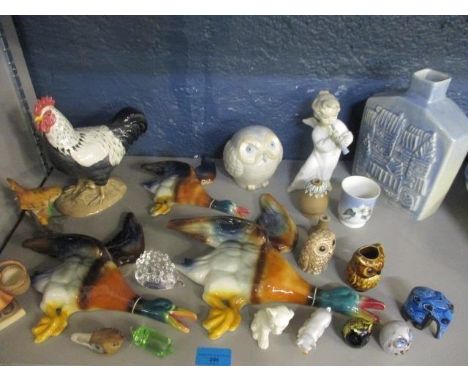 A Beswick model of a cockerel, three graduating flying geese wall plaques, mixed ornaments to include a Lladro figure of a yo