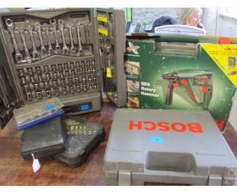 A selection of tools to include a Bosch power drill, a selection of nuts and sockets 