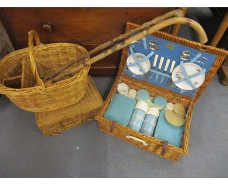 A vintage Braxton picnic set, together with mixed baskets and walking sticks 