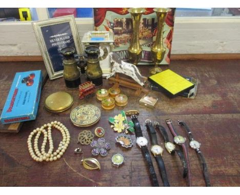 Two mid 20th century compacts, a small amount of costume jewellery, mixed watches, metalware, toys, games and a carriage cloc