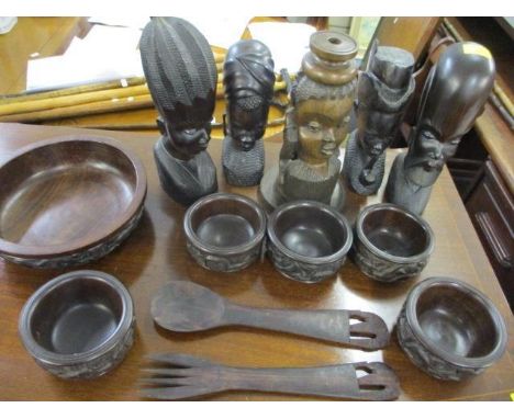 African Malawi hardwood carved busts, a salad bowl with servers, six small carved bowls and a lamp stand 