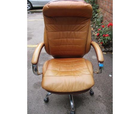 A leather covered office swivel chair 