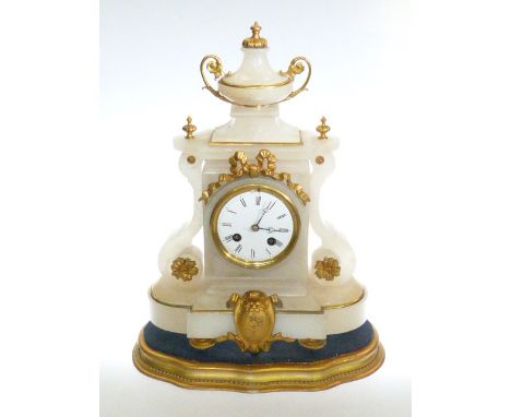 Ornate Alabaster and gilt metal Victorian mantel clock on gilt wood plinth