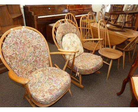 Ercol elm drop leaf dining table, eight Quaker back chairs and pair Ercol easy chairs (11)