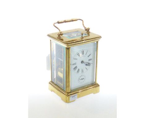 Good brass cased repeater carriage clock, Finnigans Ltd, Manchester, with box