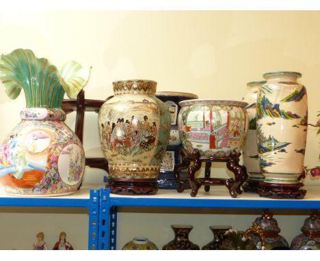 Four Oriental pottery vases, planter and pottery stool
