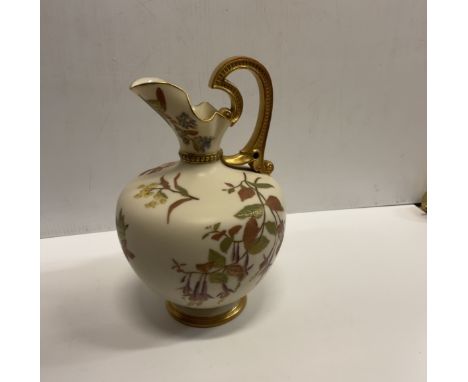 A Royal Worcester blushware pear shaped ewer with floral spray decoration raised on a circular foot date marked for 1885 36.5