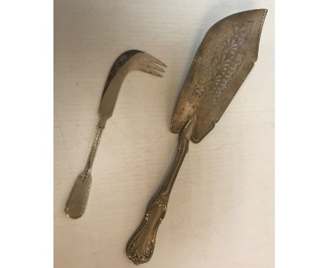 A Victorian silver fish slice with pierced blade (by George W Adams, London 1842), together with a Victorian silver and steel