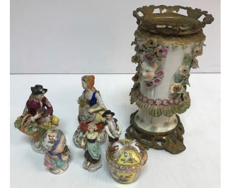 A 19th Century Continental porcelain floral encrusted vase with gilt metal mounts 21 cm high, pair of capodimonte figures of 