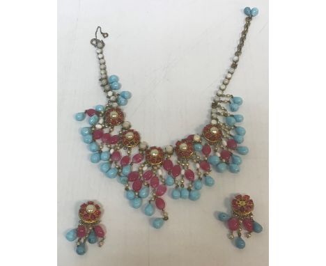 A circa 1950 Christian Dior necklace by Mitchel Maer and a pair of earrings set with simulated pearl and red paste and faux t