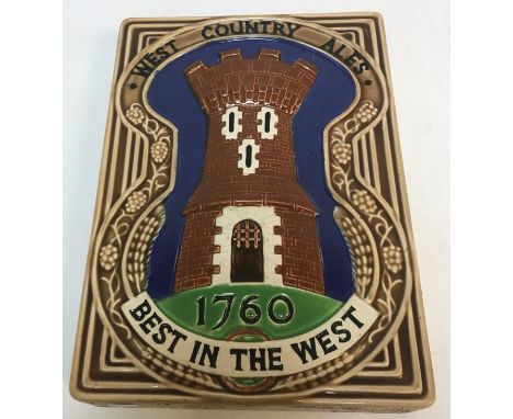 A large pottery tile/plaque inscribed "West Country Ales 1760 Best in the West" circa 1958/1967 for West Country Breweries an