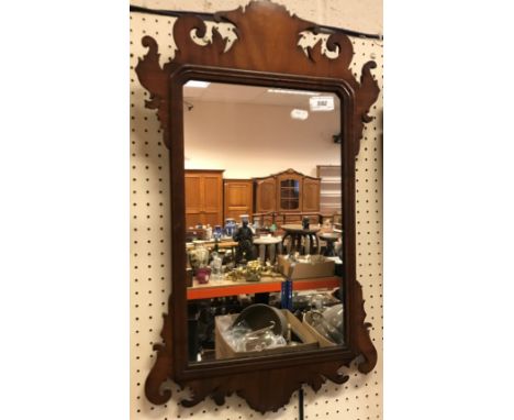 A 19th Century mahogany fretwork carved wall mirror in the early 18th Century manner 67 cm x 40 cm together with a mahogany w