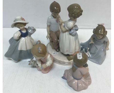 Two Lladro figures, one of a young boy and girl, the other of a ballerina, together with five various Nao figures, a collecti