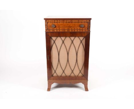 A Regency style mahogany cabinet, 20th century, with a single drawer above a cupboard door with metal grille enclosing shelve