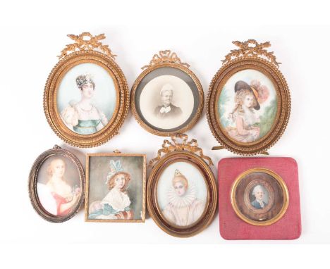 A group of five portrait miniatures on ivory, 19th /early 20th century, comprising a gentleman within a faux wood border, fou