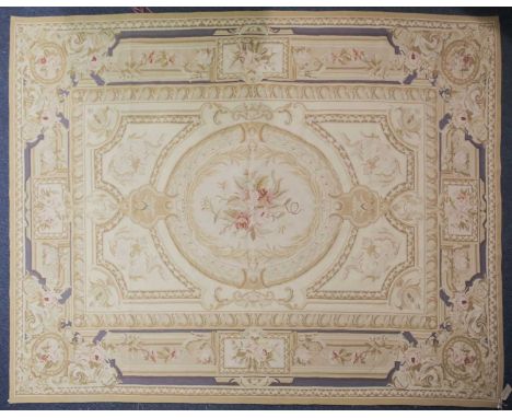 A 20th century "Aubusson" style carpet with formal architectural scheme in muted autumnal tones. 304 cm x 188 cmCondition rep