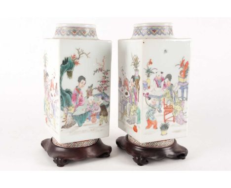 A pair of Chinese famille rose 'Cong' vases, Republic period or later, the neck with a band of ruyi with red bats to each cor