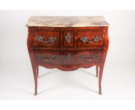 A Louis XV style, walnut and kingwood veneered 'Bombe' two-drawer commode, with shaped serpentine top and gilt metal mounts t