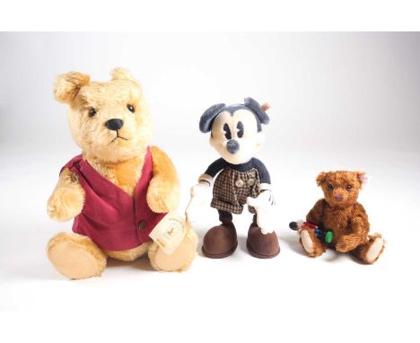 A large Steiff 2004 limited edition (2521/3500) "Winnie the Pooh" Teddy bear with tag and ear button. 50 cm high. Together wi