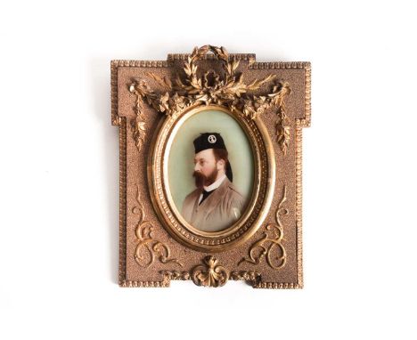 A 19th century reverse-painted oval portrait on glass of Edward VII as the Prince of Wales, 13.5 cm x 9.5 cm in an ornate gil
