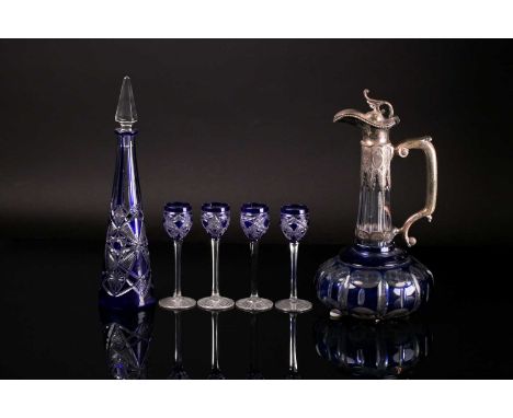 A Bohemia glass ewer with silver plated mounts, late 19th century, the body with blue overlaid on clear glass, 28cm; together