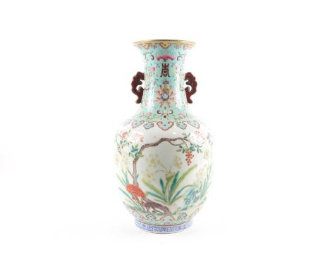 A Chinese Famille rose porcelain baluster vase with a pair of pierced fungus handles, Republic era, painted with palmettes, S